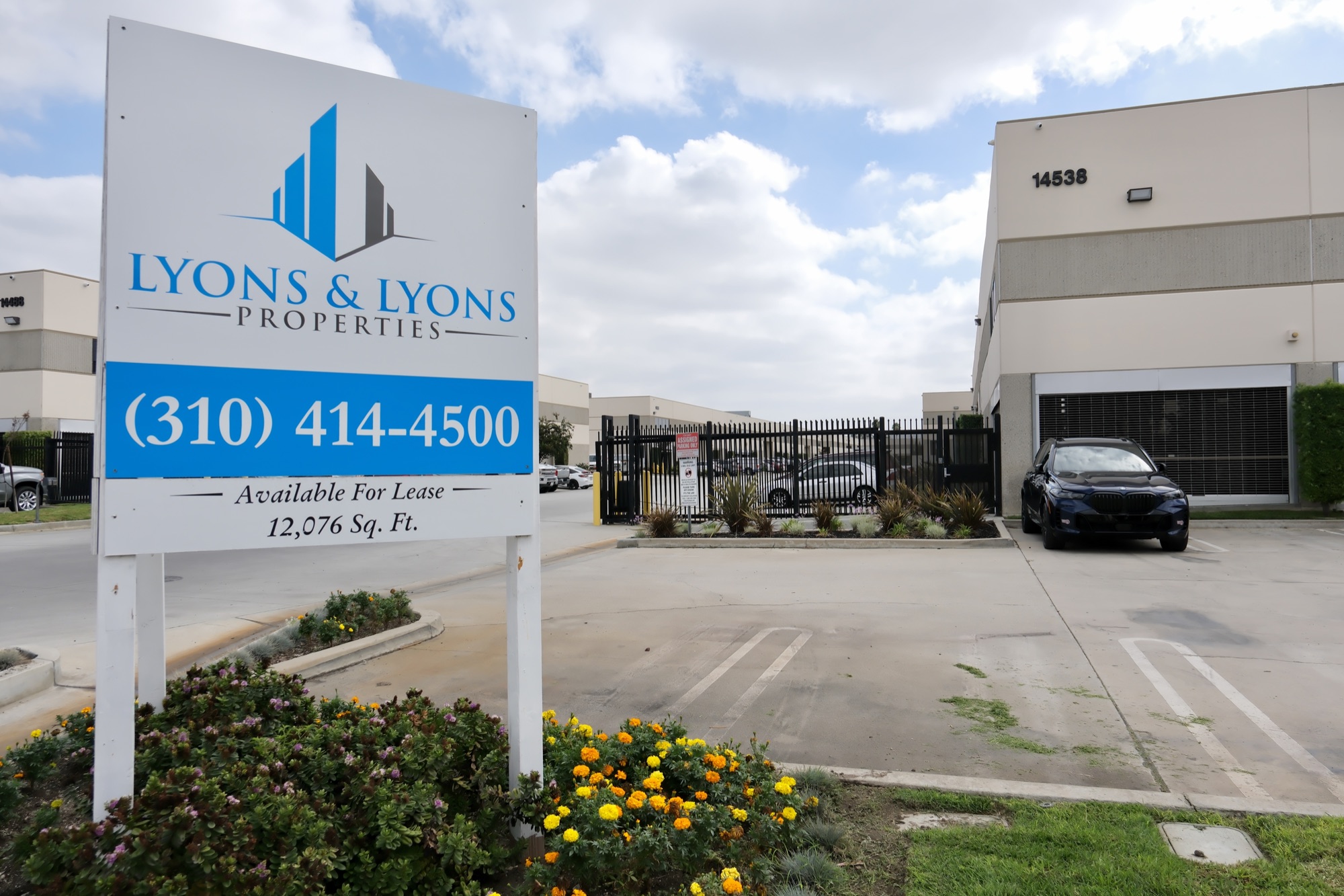 Lyons & O’Brien R.E. leasing sign at 14538 Garfield Ave, available for lease at 12,076 Sq. Ft.