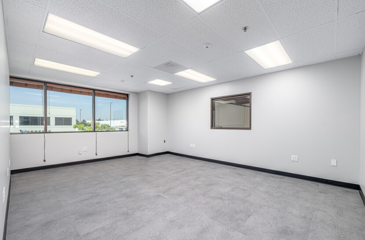 Mezzanine office with clerestory window overlooking the park