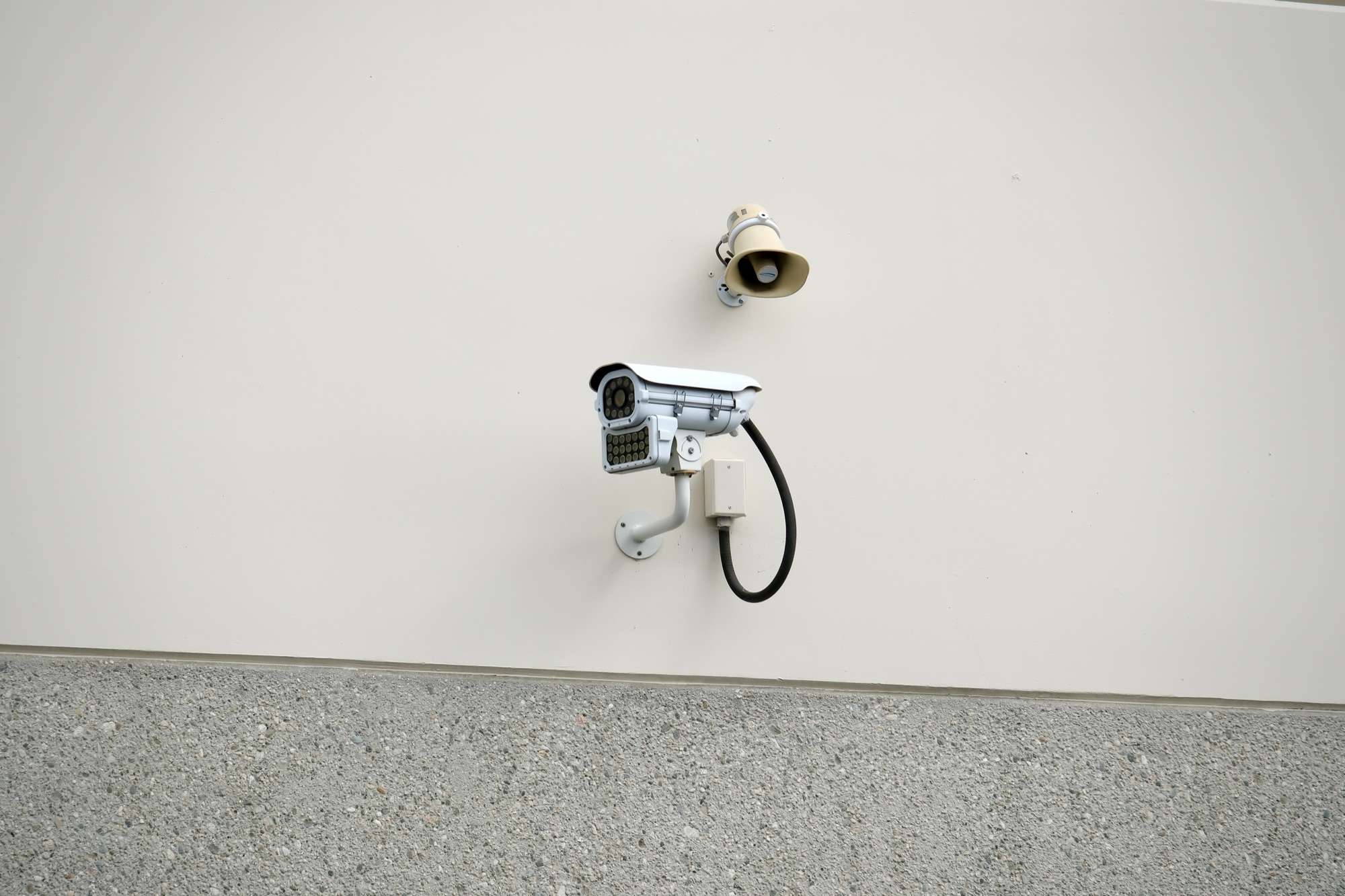 Security camera with infrared illuminator mounted at a Garfield Avenue building