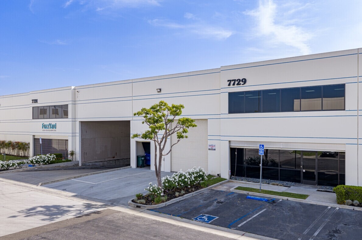 7729 and 7731 Somerset Blvd elevation with grade-level loading and office entries