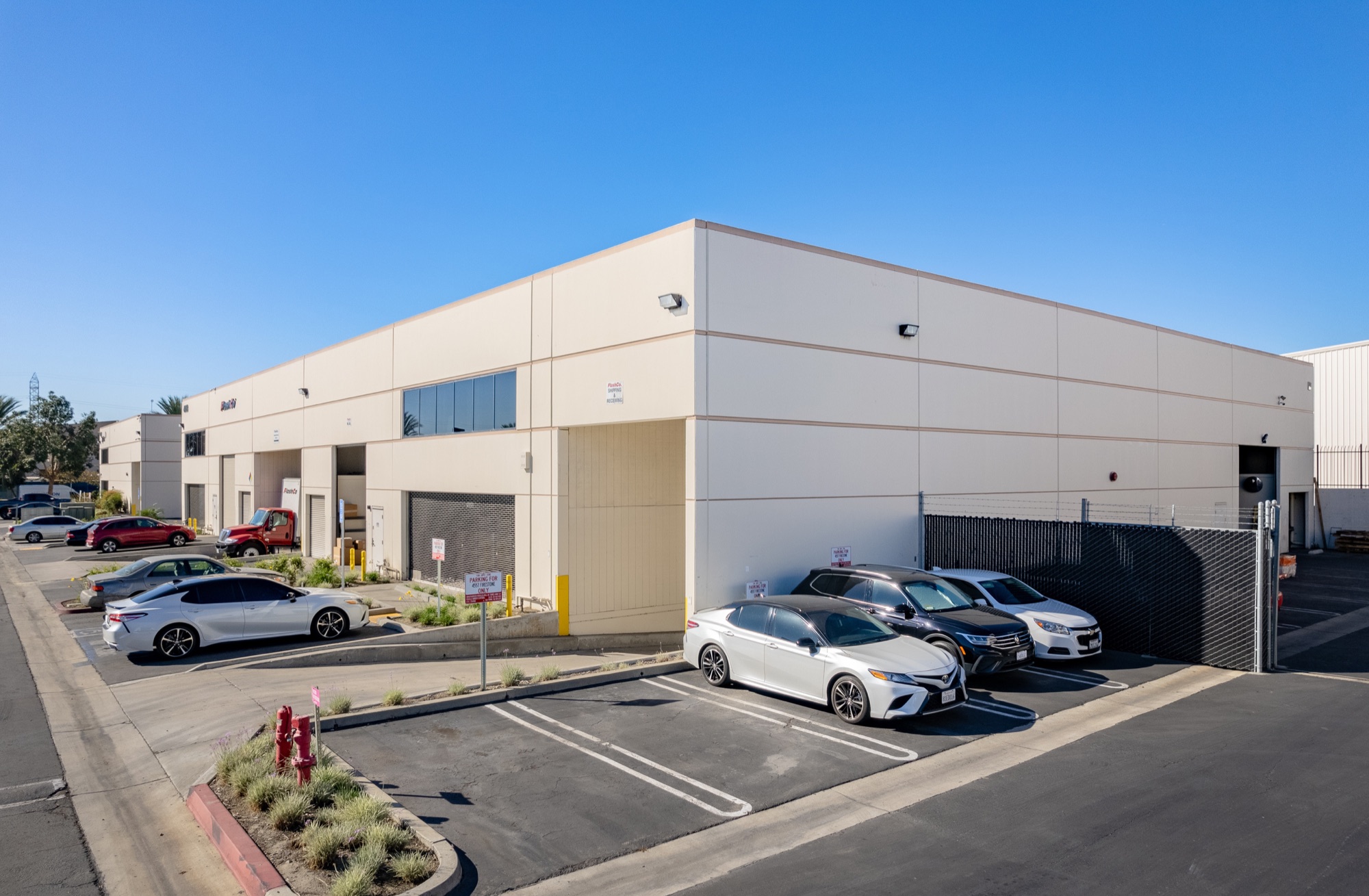 Building corner elevation and tenant parking